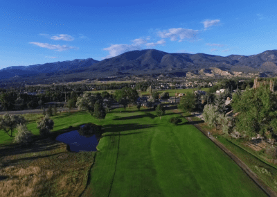 Aerial drone view of the range at the Salida Golf Course peak of summer with Collegiate Peaks Mountain Range views in the background