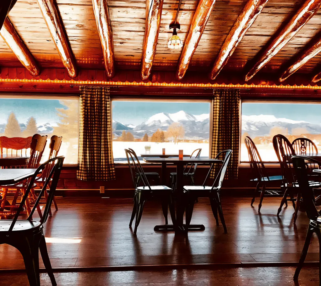Golf Cabin Restaurant in Salida on the Golf Course - Dining room views of collegiate peaks mountain range Golf Cabin Restaurant in Salida on the Golf Course - Dining room views of collegiate peaks mountain range