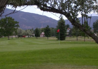 Hole 4 view at the Salida Golf Course peak of summer with Collegiate Peaks Mountain Range views in the background - best views and most affordable golf in the high Colorado Rockies