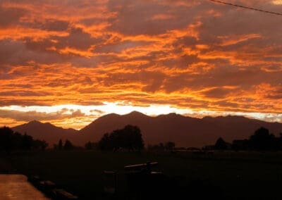 Sunset red and orange Views of the Collegiate Peaks Mountain Range from the Salida Golf Course Colorado - Best views and most affordable golf in the High Colorado Rockies