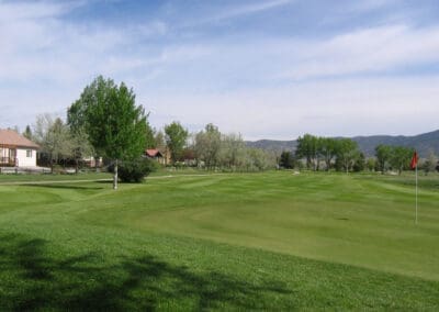 Hole 2 view at the Salida Golf Course peak of summer with Collegiate Peaks Mountain Range views in the background - best views and most affordable golf in the high Colorado Rockies
